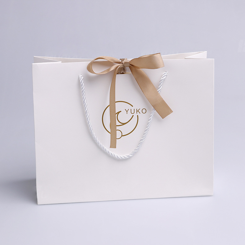 Custom White Gold Foil Logo Paper Gift Bag With Satin Bow Ribbon
