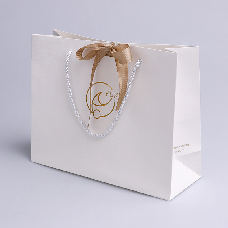 Custom White Gold Foil Logo Paper Gift Bag With Satin Bow Ribbon